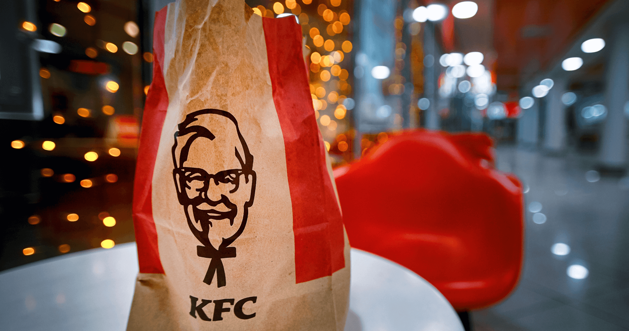 KFC packaging on table in shopping centre