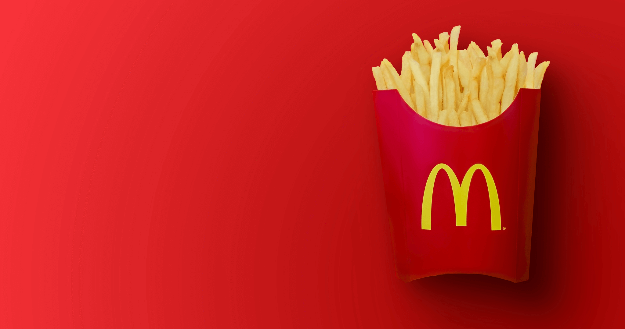 McDonalds fries on red background