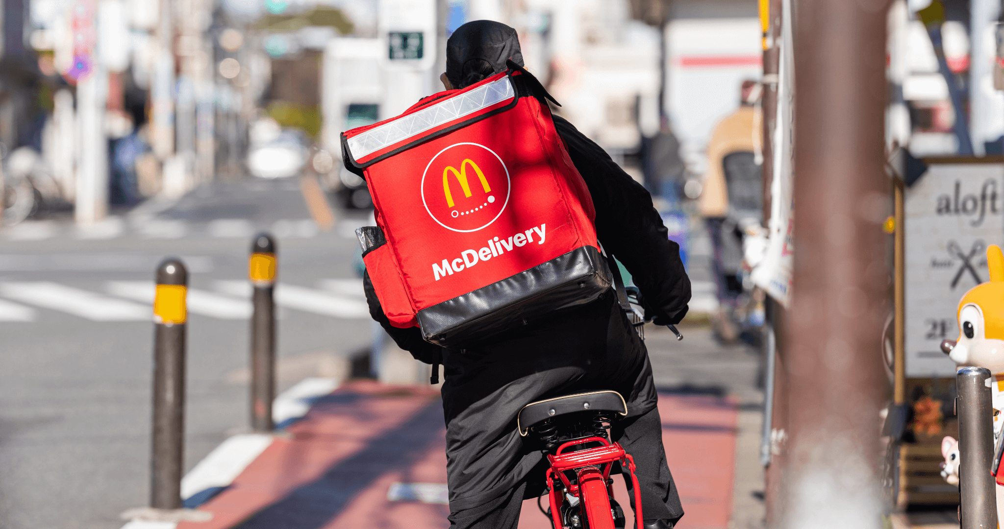 McDonalds delivery rider on bike