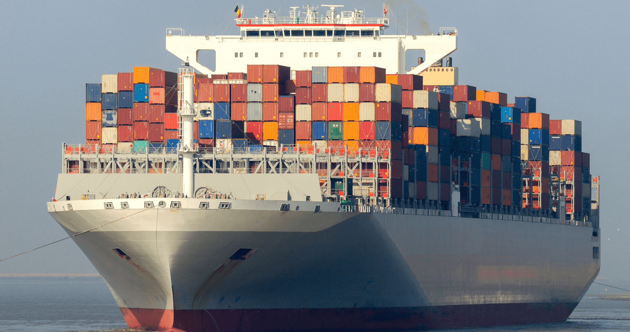 fully loaded container ship at sea