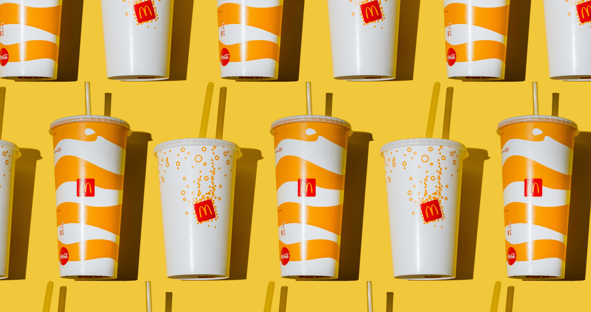 McDonalds drinks packaging on yellow background 